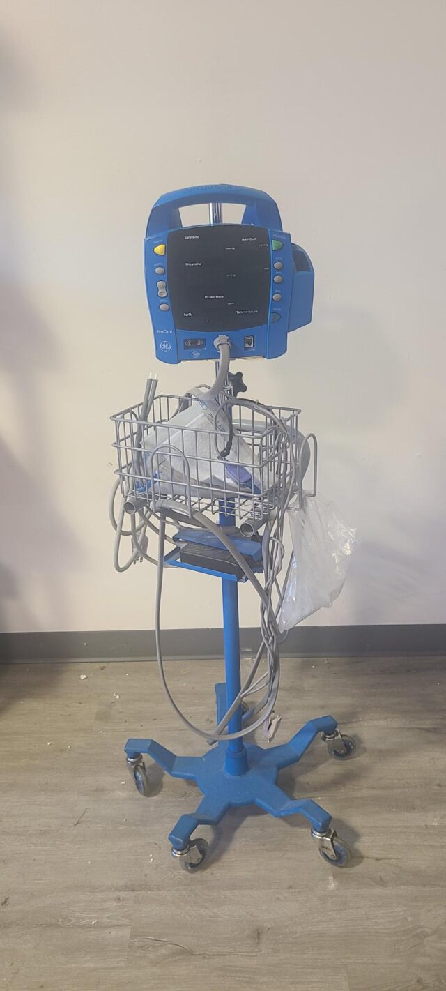 Qty (13) GE Dinamap Procare Patient Monitors on a stand ECG